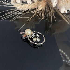 Vintage rhinestone faux pearl brooch